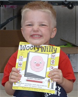 Kids have fun with Wooly Willy toys during opening day of Wooly Willy Wonderdaze.