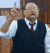 Ross Porter, auctioneer, Hamlin Memorial Library 25th Annual Dinner & Auction.