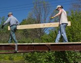 PCTA members restore Shawmut Trail Bridge over Blacksmith Brook.  [Photo by Les Jordan, Jr.]