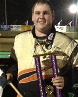 Garrett Mott receives race and track championship trophies sponsored by Smethport Web Services' Nathan and Linda Muller.